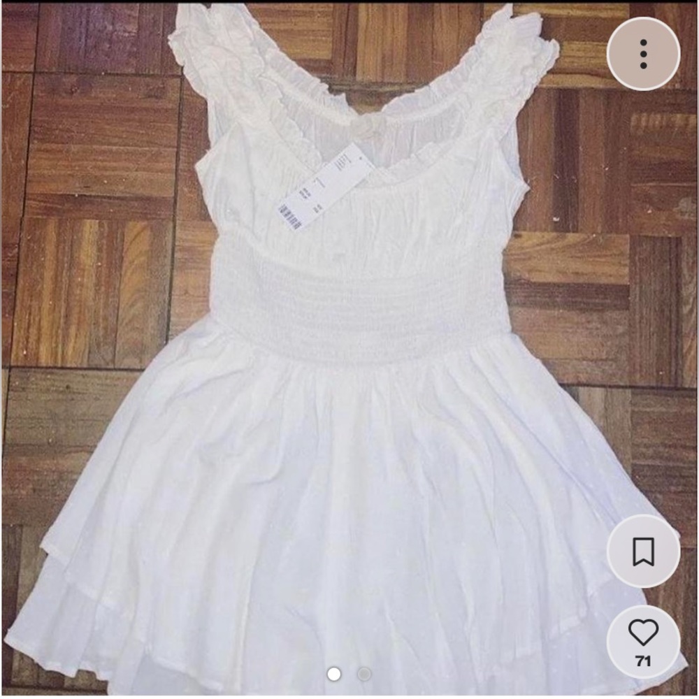 Urban Outfitters white romper 
New with tags, never worn!
$80
Size small
